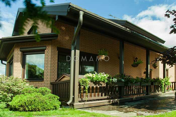 Проект дома из пеноблоков с постирочной на мансардном этаже