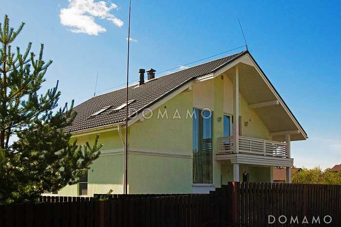 Проект кирпичного дома с угловой террасой