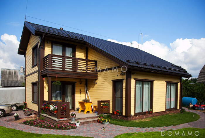 Проект каркасного дома с балконом