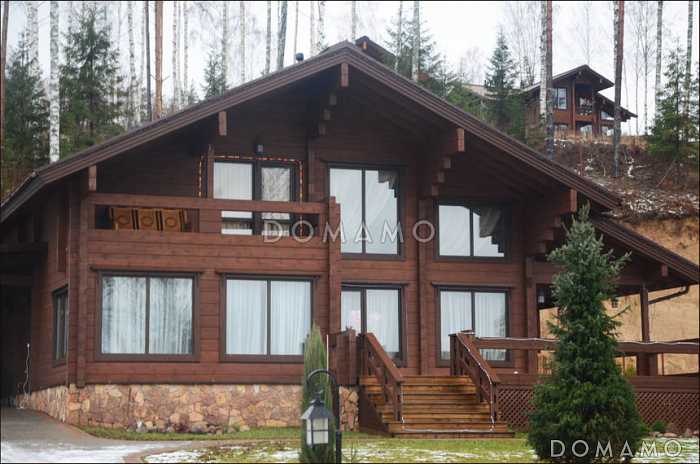 Проект дома из клееного бруса с красивыми крытыми террасами