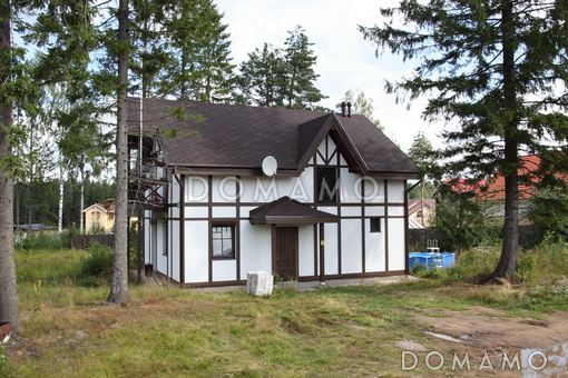 Проект каркасного дома в стиле фахверк с сауной на мансардном этаже