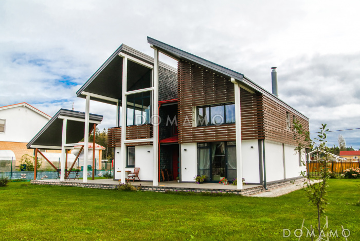 Проект современного дома из кирпича с изолированной кухней