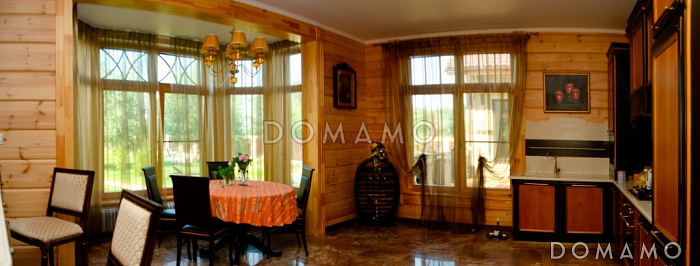 Проект двухэтажного дома из клееного бруса с бассейном и сауной на первом этаже