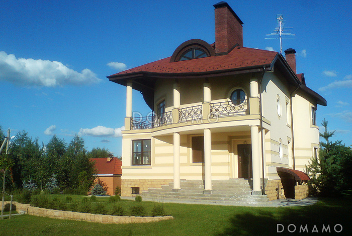 Проект коттеджа с двусветной гостиной и зимним садом