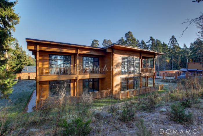 Проект двухэтажного дома из клееного бруса с кабинетом на первом этаже