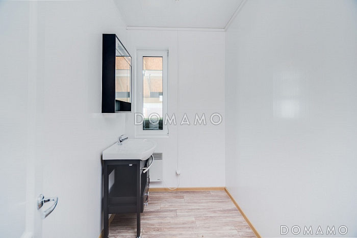 Проект стильного дома из клееного бруса с балконом