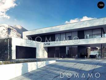 Проект просторного современного двухэтажного дома из газобетона с плоской крышей,  с верандой, гаражом и террасами на обоих этажах