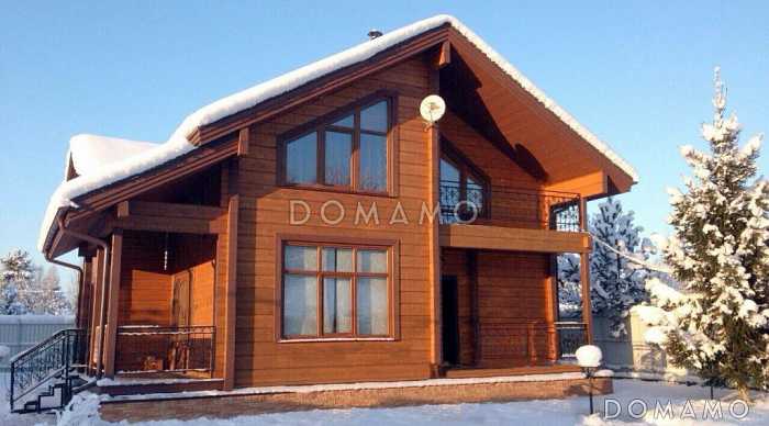 Проект деревянного дома из клееного бруса с гостинной на втором этаже