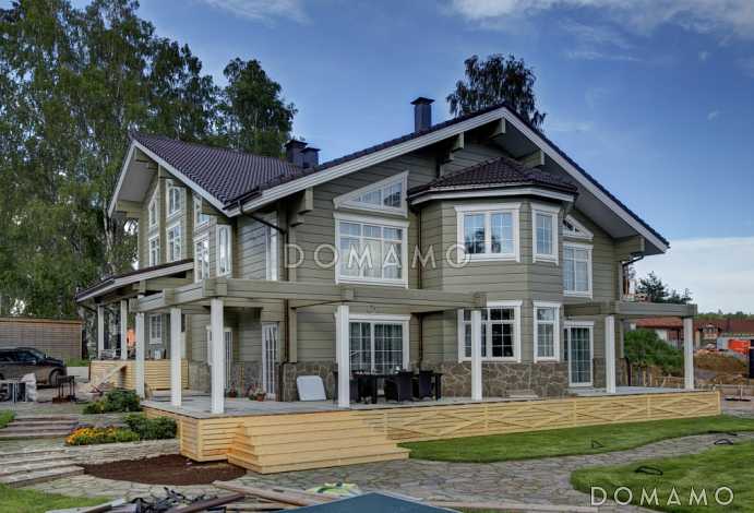 Проект огромного дома из клееного бруса общей площадью более 600 м2