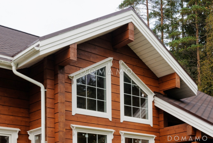 Проект деревянного дома из клееного бруса с большой совмещенной гостиной с кухней