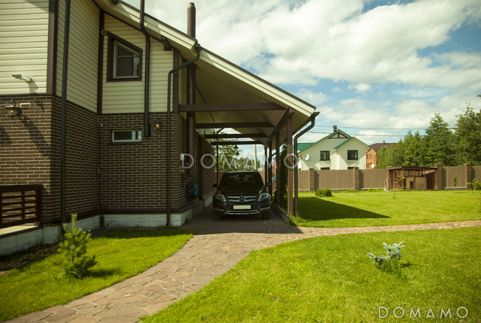 Проект дома из газобетонных блоков с отделкой из двух материалов