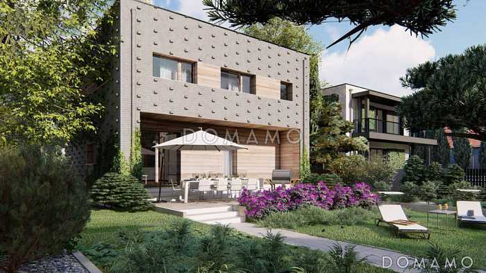 Проект дома с подземным гаражом на два автомобиля, кабинетом, светлой дневной зоной, спальнями на втором этаже