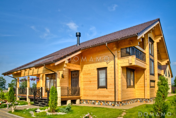 Проект двухэтажного дома из клееного бруса с бассейном и сауной на первом этаже